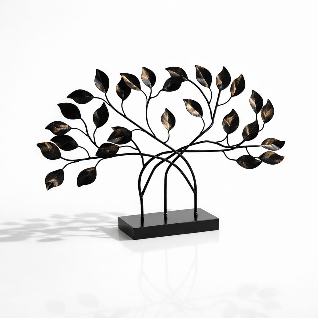 Handcrafted Aurelia metal tree sculpture with gold leaves and black rectangular base for modern home decor.