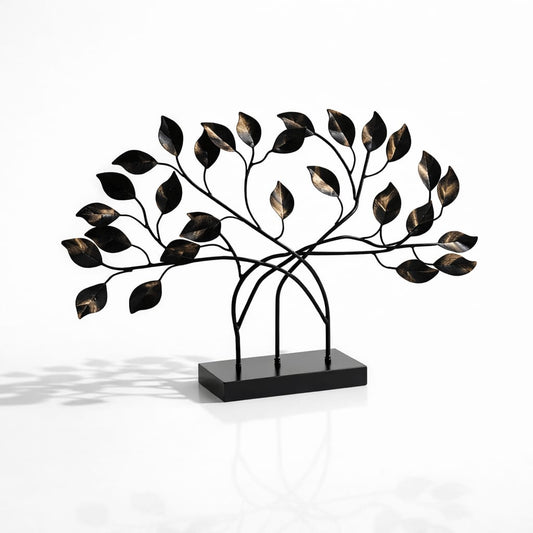 Handcrafted Aurelia metal tree sculpture with gold leaves and black rectangular base for modern home decor.