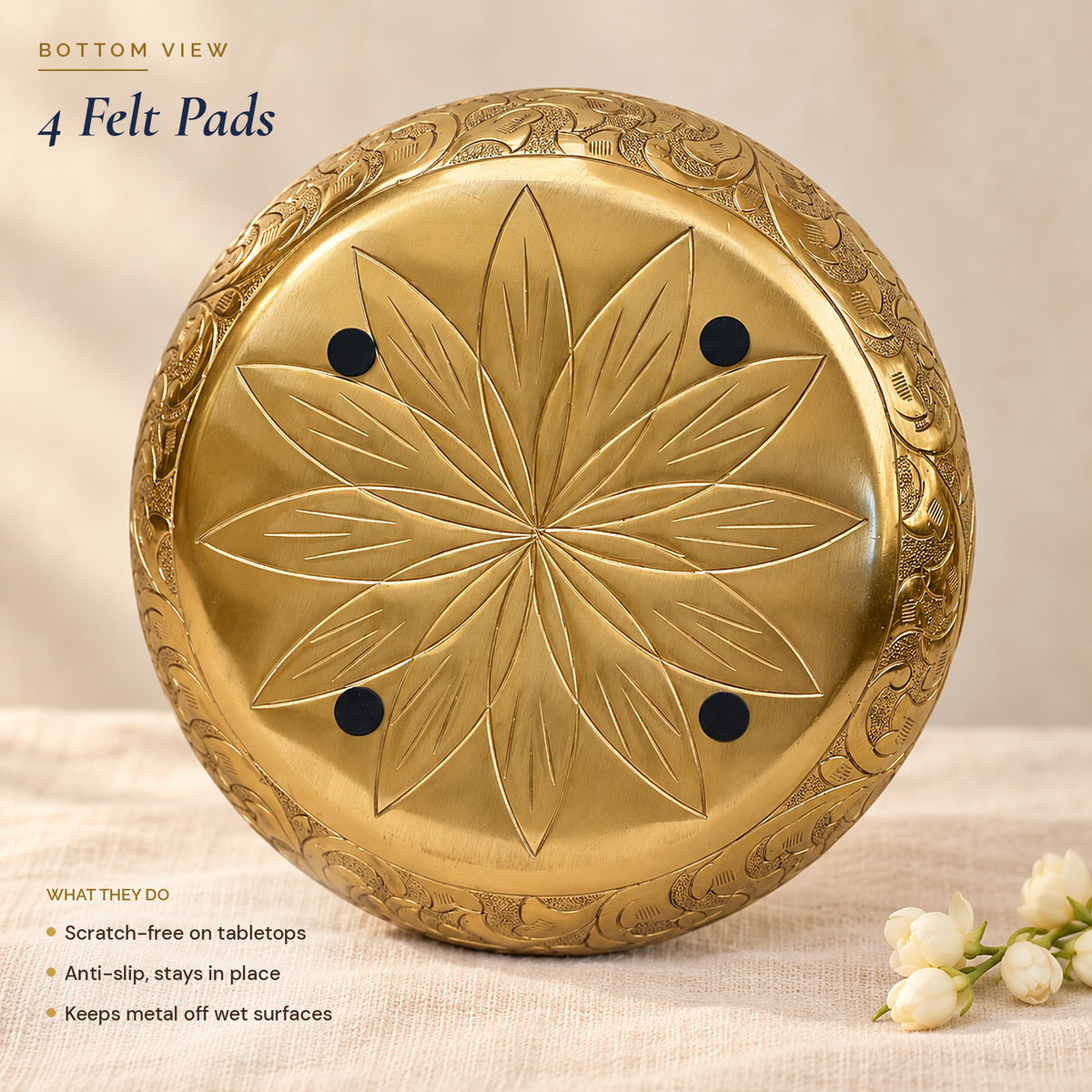 Underside of the Chitra urli with the lotus and four black felt pads