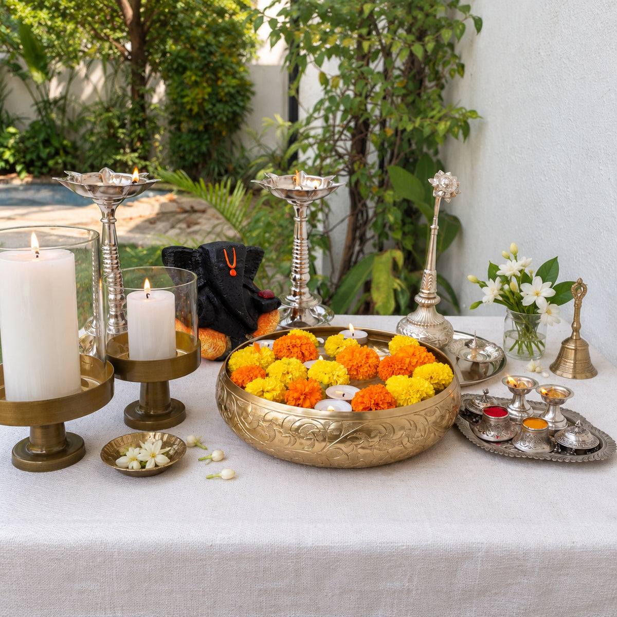 Chitra urli filled with marigolds in a garden