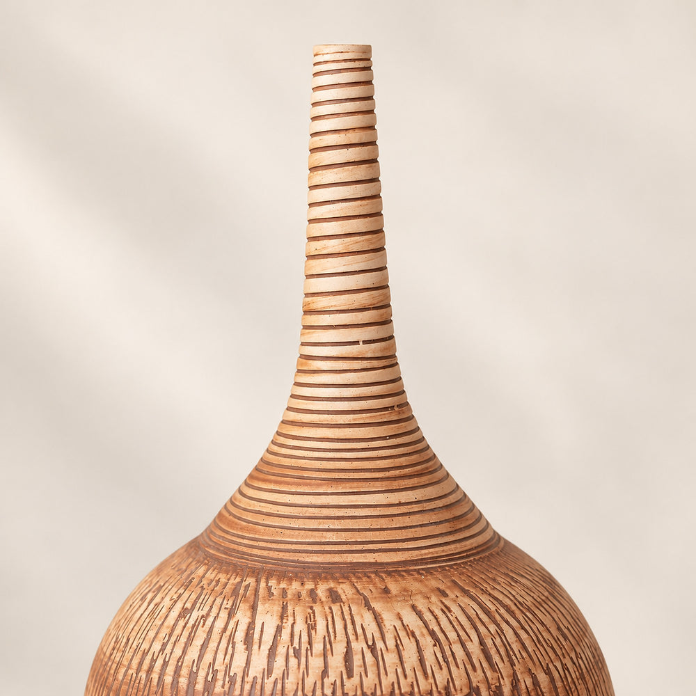 Hand-carved relief close-up on the Imber Long-Neck Earthy Brown ceramic vase