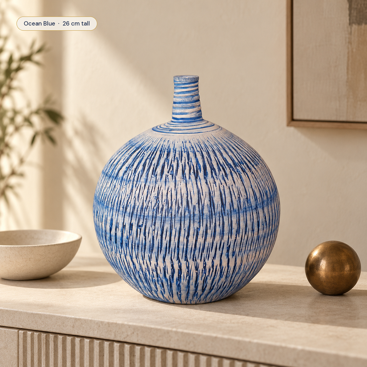 Imber Round Bud ceramic vase in Ocean Blue in a modern interior