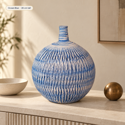 Imber Round Bud ceramic vase in Ocean Blue in a modern interior