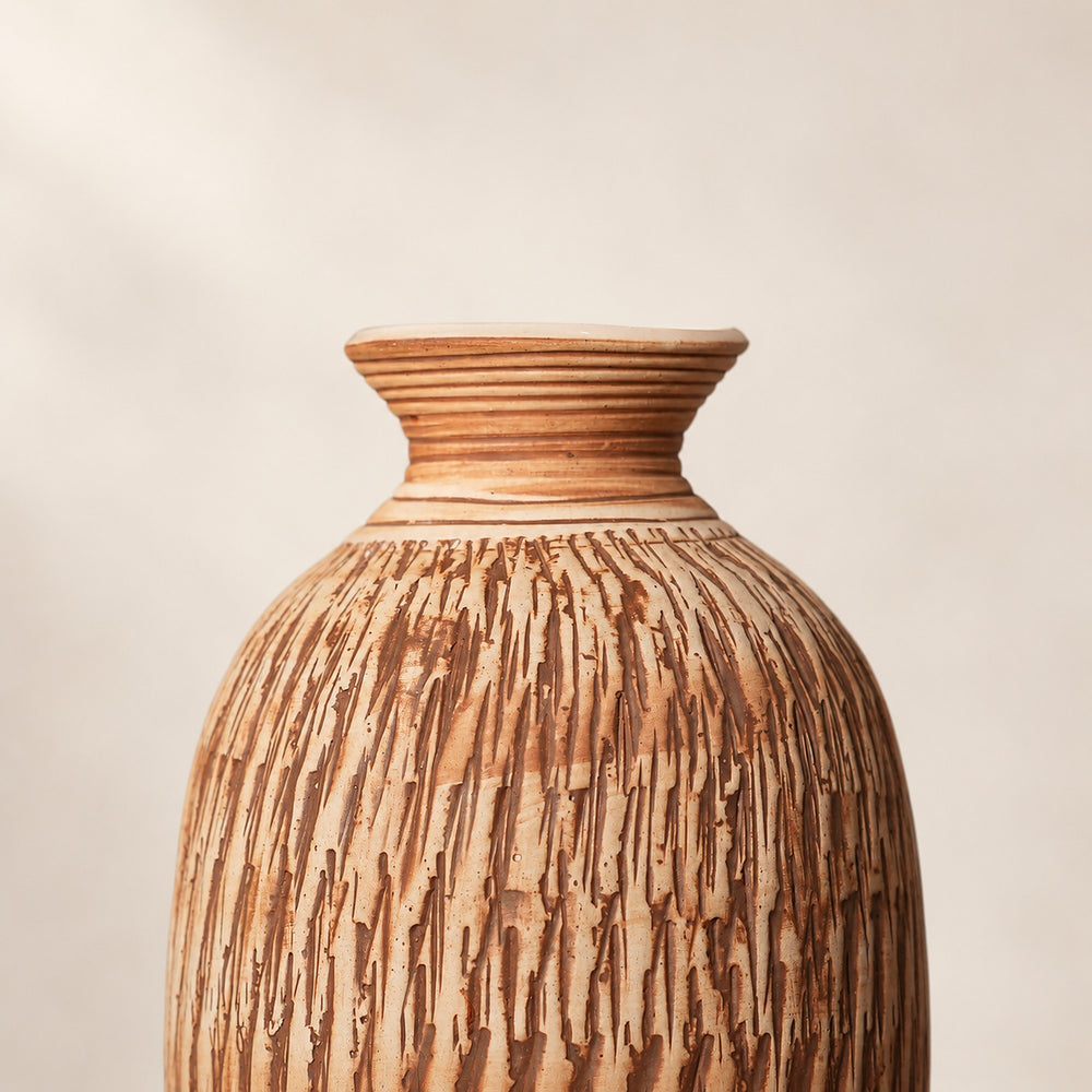 Hand-carved relief close-up on the Imber Tall Earthy Brown ceramic vase